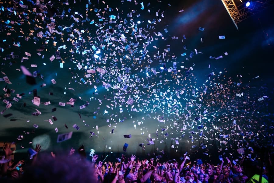 Confetti falling over a cheering crowd at a party